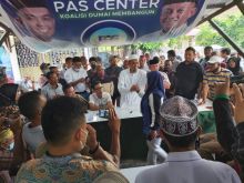 Konferensi pers pasangan Paisal Amris
