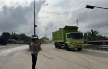 Polisi Siaga di Exit Tol Minas, Pastikan Arus Mudik Aman dan Lancar