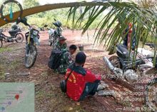 Babinsa Koramil 06/PWK Sabak Auh Laksanakan Patroli Karhutla di Kampung Tuah Indrapura