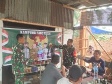 Babinsa Koramil 01/Siak Perkuat Jiwa Nasionalisme di Srigading 