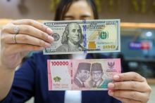 Rupiah dan Dolar AS. Sumber: Pintu